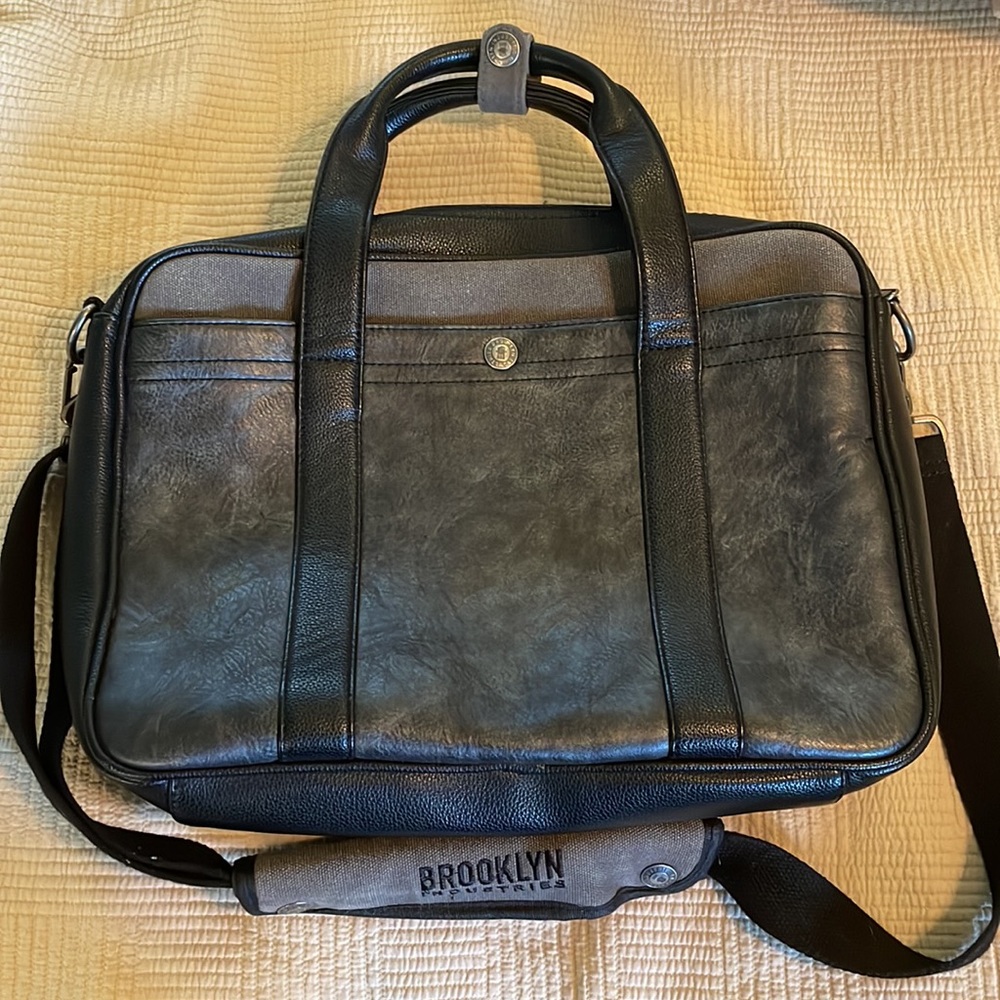 Vegan leather crossbody laptop bad, grey and black. Three pocket.